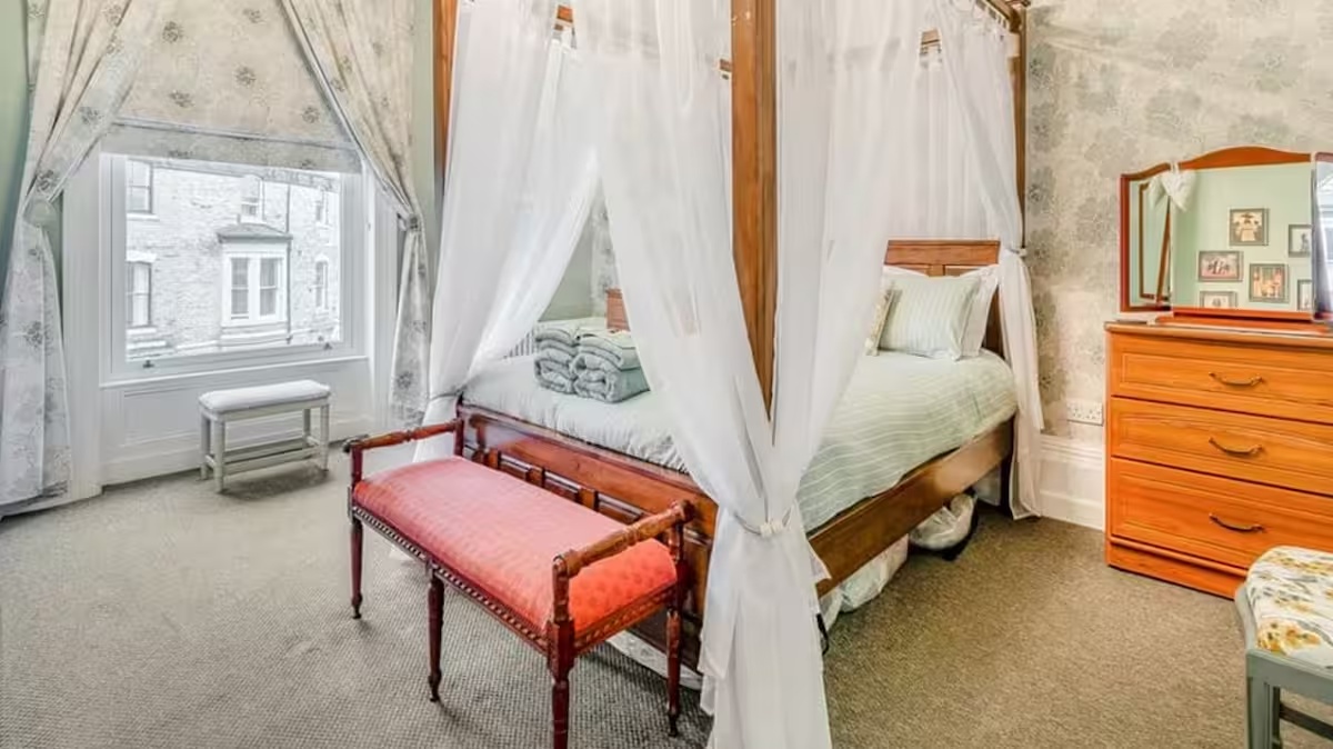 Four-poster king bedroom at Belvedere